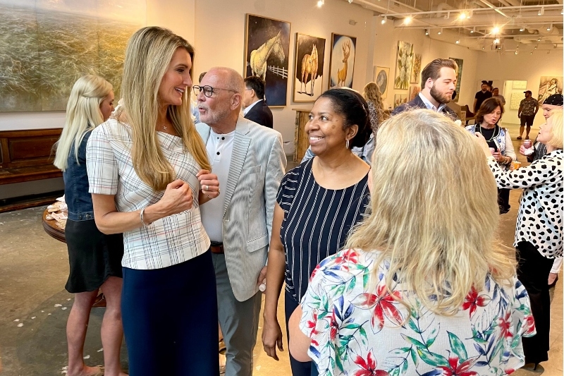 Kelly Loeffler with community members and small business owners